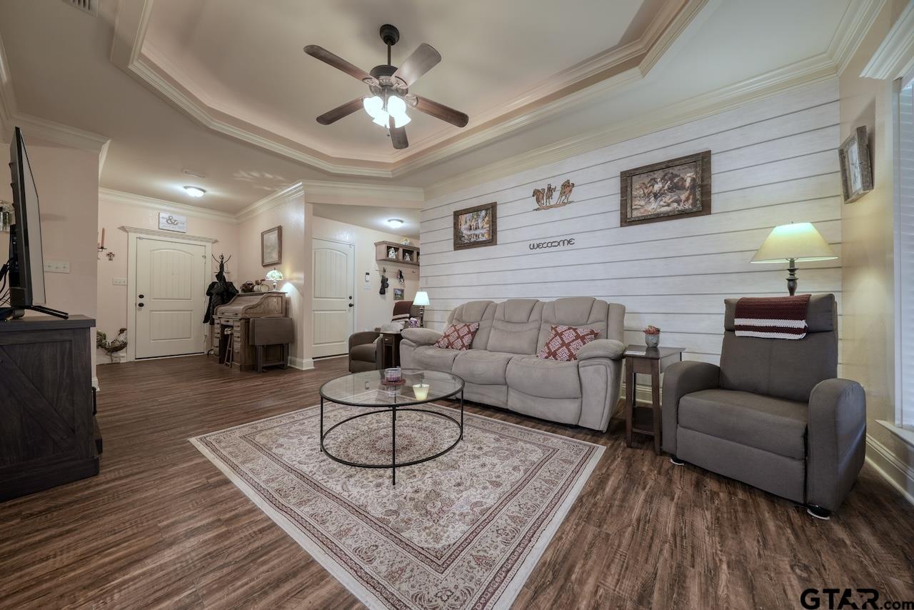 412 Elm Lane Lindale, TX 75771 - Photo 8 of 48 a living room with furniture and a chandelier