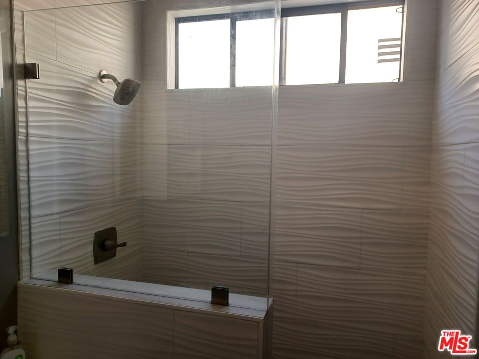 1427 17th Street Santa Monica, CA 90404 - Photo 12 of 13 a bathroom with a shower