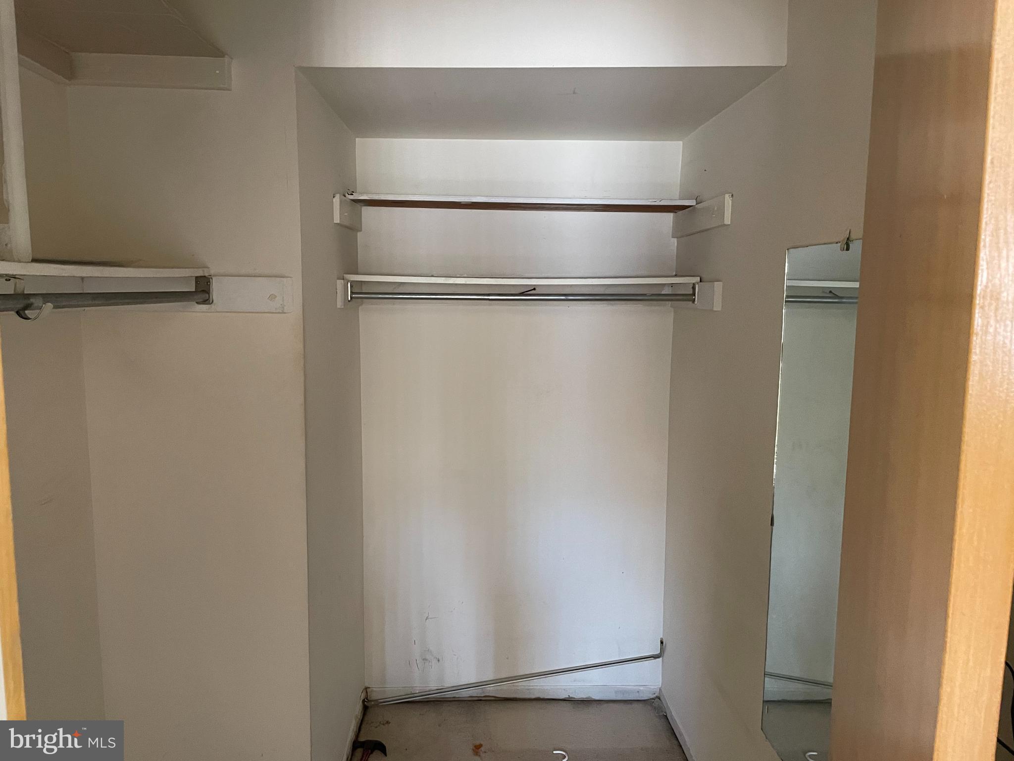 3156 Apple Road Northeast, Unit 18 Washington, DC 20018 - Photo 14 of 16 a view of walk in closet with empty racks