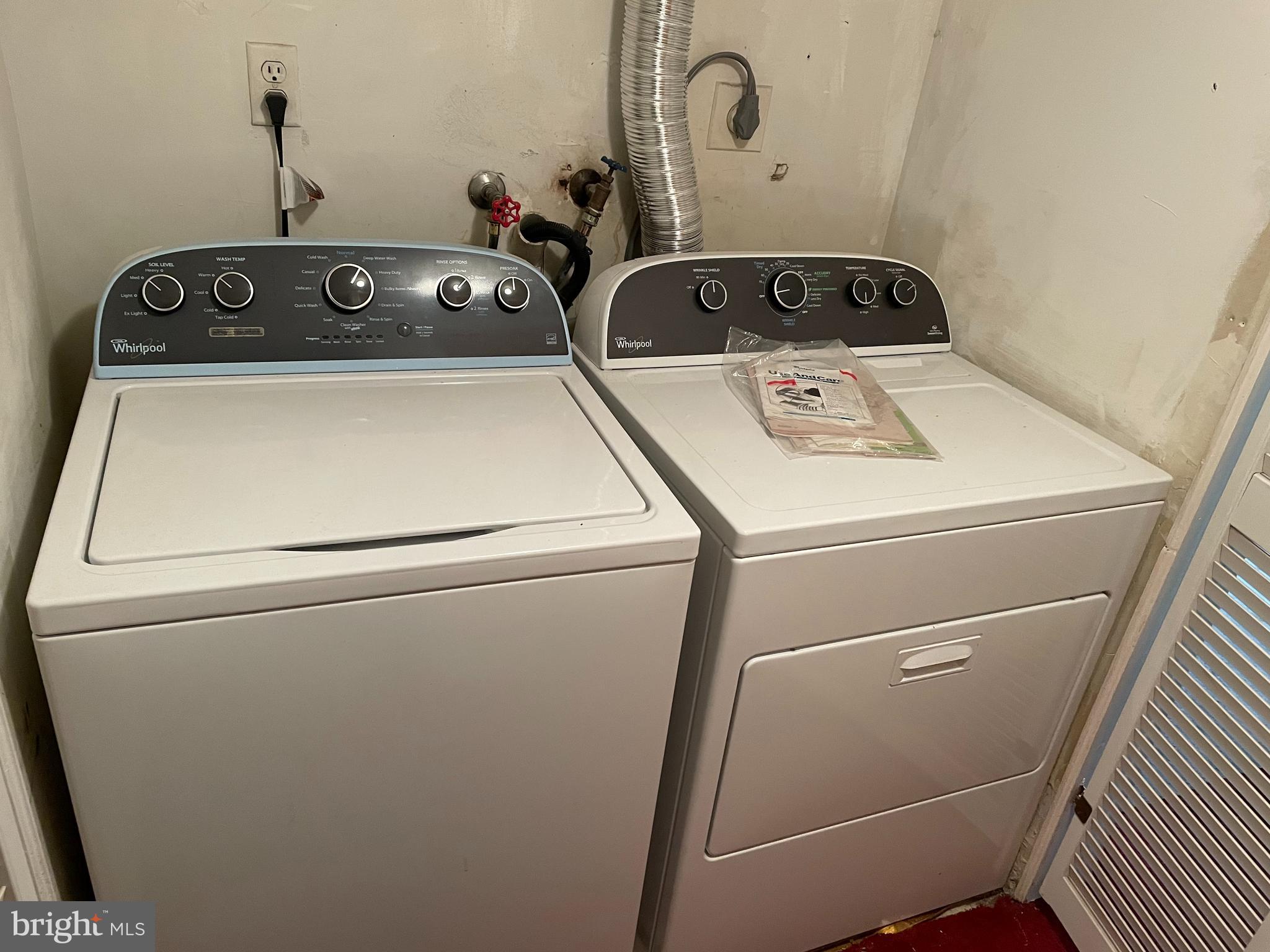 3156 Apple Road Northeast, Unit 18 Washington, DC 20018 - Photo 15 of 16 a close up view of a washer and dryer