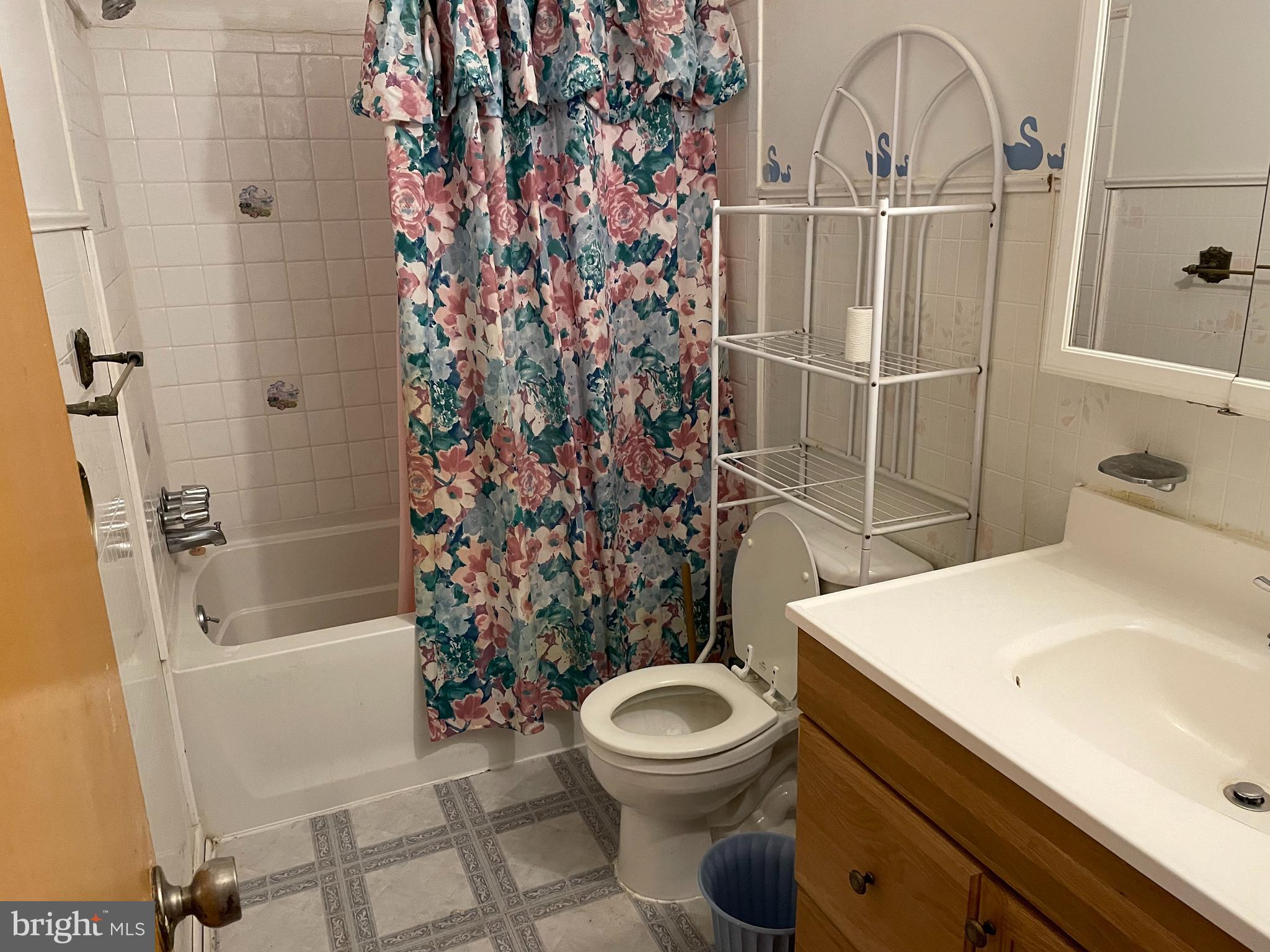 3156 Apple Road Northeast, Unit 18 Washington, DC 20018 - Photo 10 of 16 a bathroom with a sink a toilet and shower