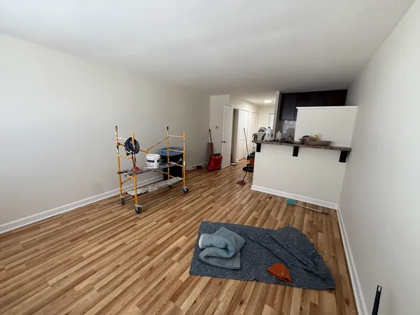a bed room with a bed and window
