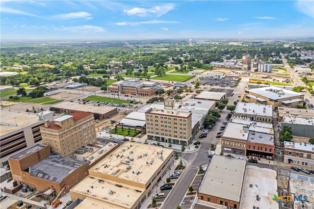 an aerial view of a city with lots of residential buildings