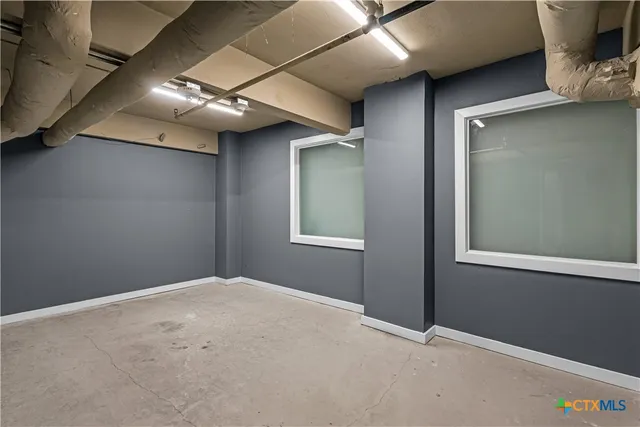 an empty room with windows