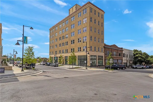a view of a city with tall buildings