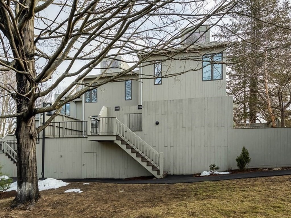 101 Mill Pond, Unit 101 North Andover, MA 01845 - Photo 2 of 27 a view of a street with large trees