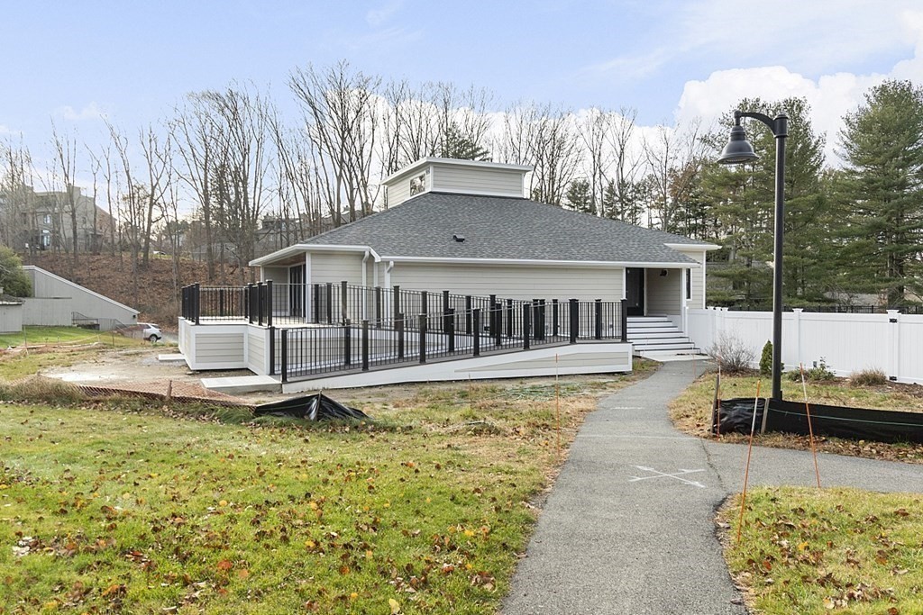 101 Mill Pond, Unit 101 North Andover, MA 01845 - Photo 25 of 27 a view of a house with swimming pool