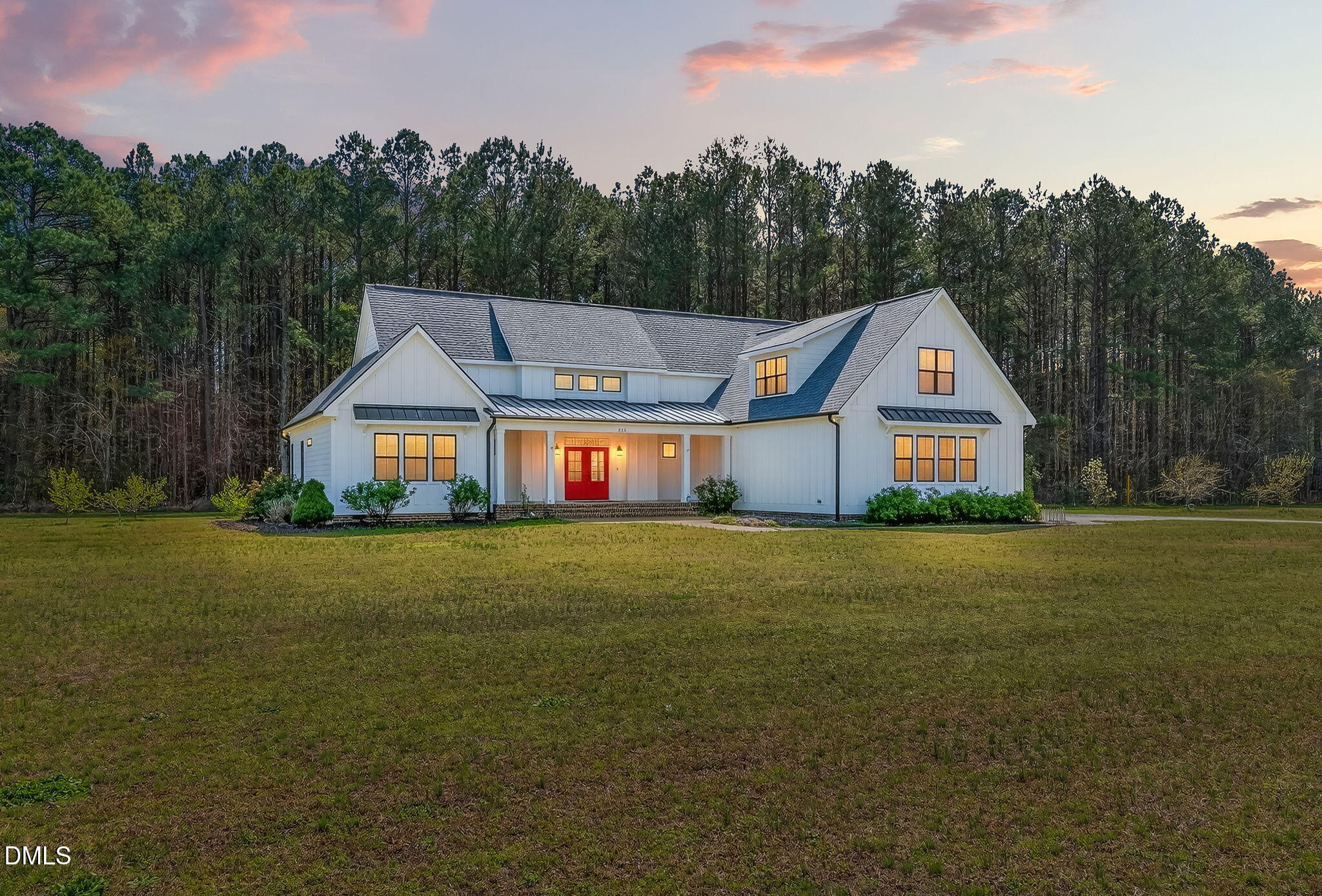 325 Old Stancil Road Kenly, NC 27542 - Photo 1 of 54 a front view of a house with garden