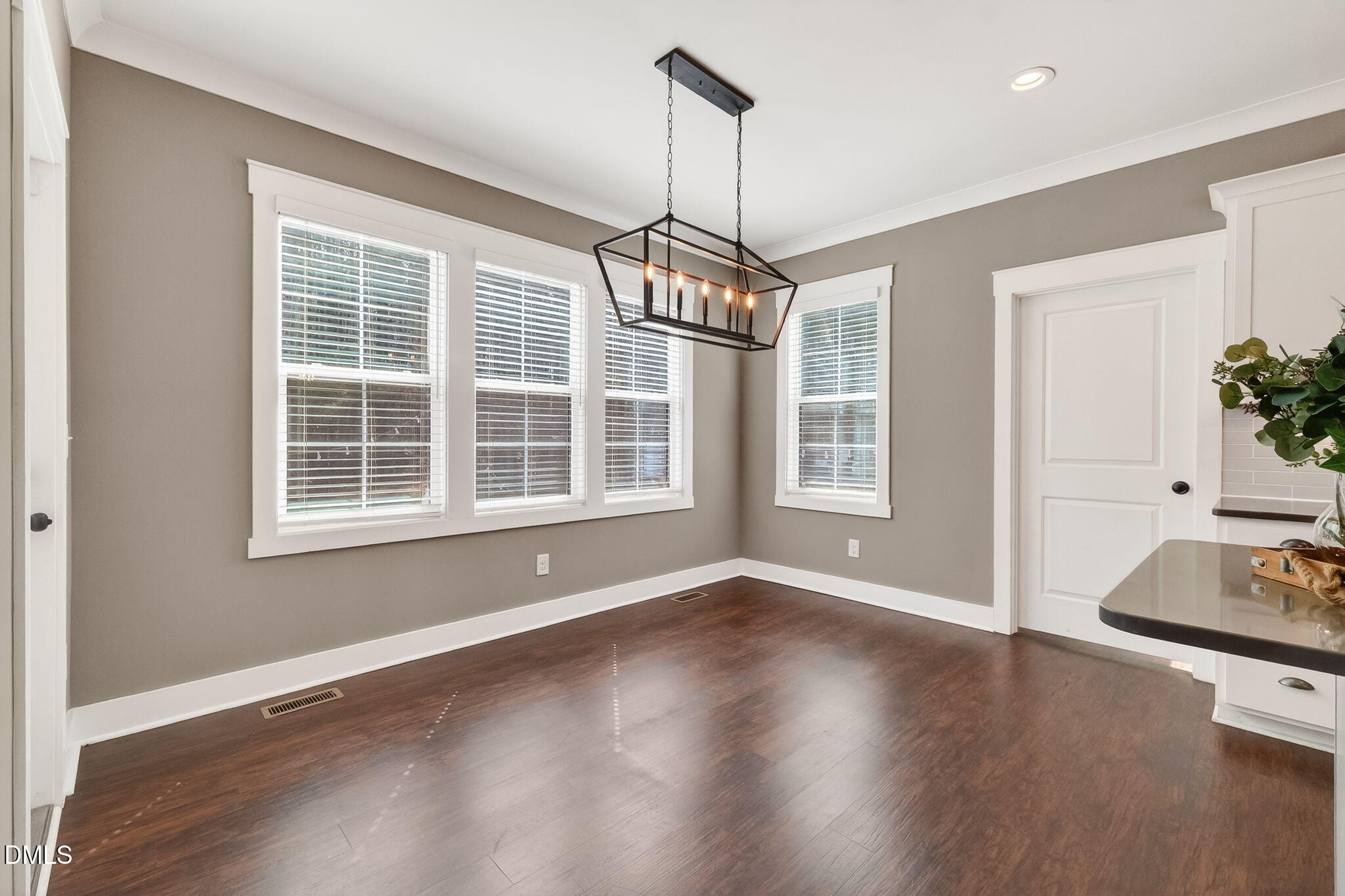 325 Old Stancil Road Kenly, NC 27542 - Photo 20 of 54 a view of wooden floor and windows in a room