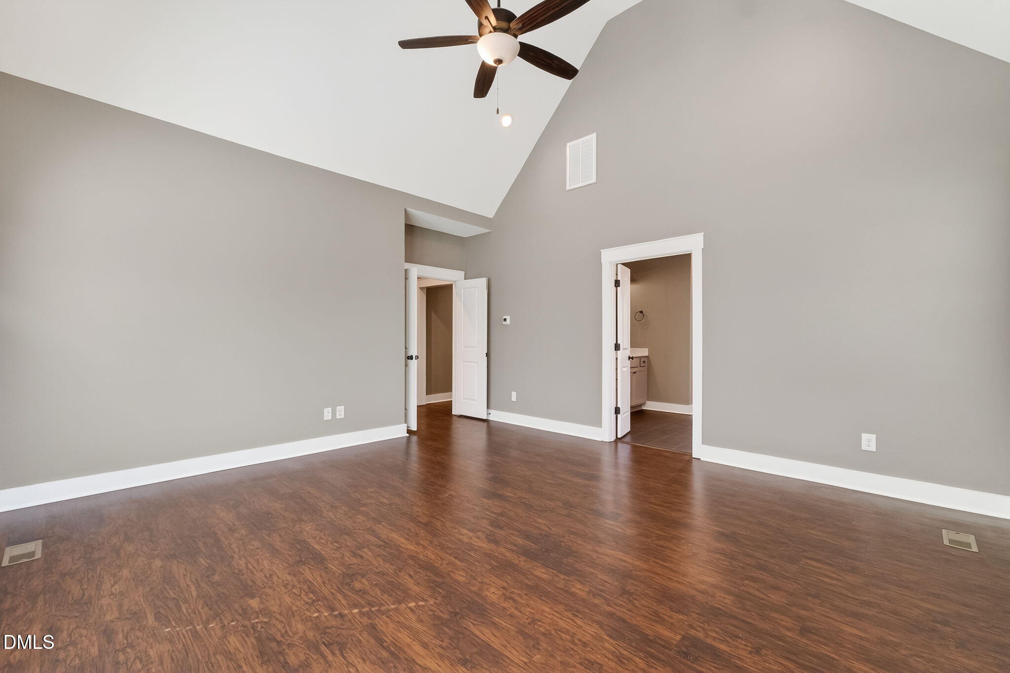 325 Old Stancil Road Kenly, NC 27542 - Photo 23 of 54 a view of an empty room with window and wooden floor