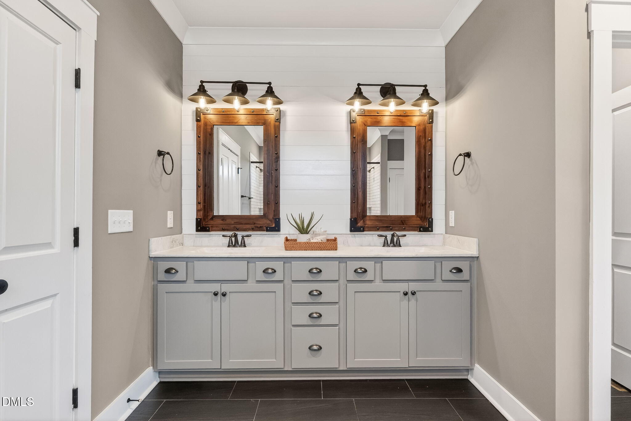 325 Old Stancil Road Kenly, NC 27542 - Photo 24 of 54 a bathroom with double vanity and a mirror