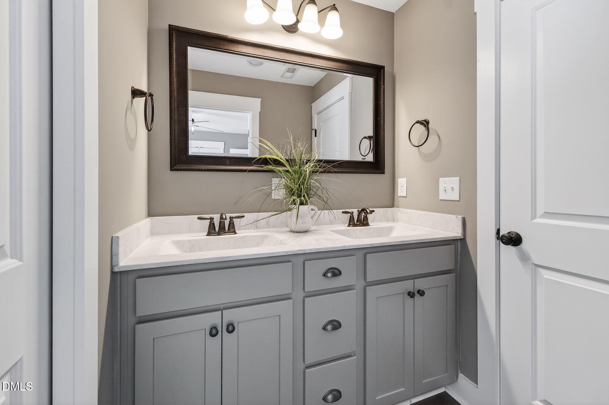 325 Old Stancil Road Kenly, NC 27542 - Photo 42 of 54 a bathroom with a granite countertop sink vanity and a mirror