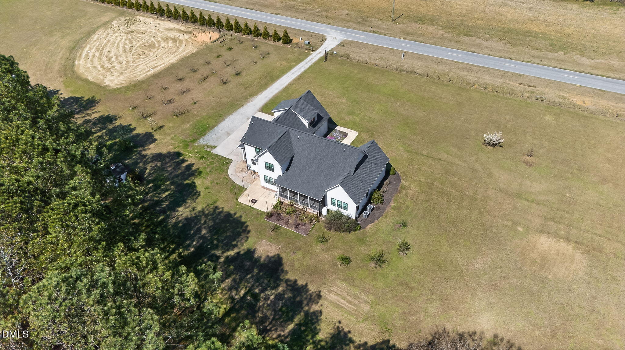 325 Old Stancil Road Kenly, NC 27542 - Photo 51 of 54 a aerial view of a house with a yard and large trees