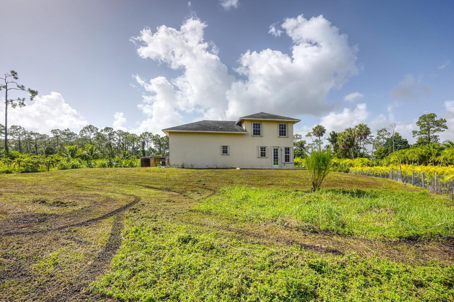 1550 C Road Loxahatchee Groves, FL 33470 - Photo 18 of 23 1550 C back yard