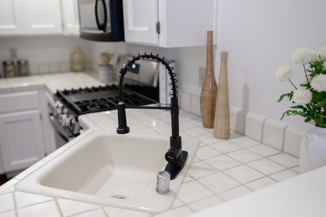 132 Arabian Way Scotts Valley, CA 95066 - Photo 18 of 82 a kitchen with a sink and a stove top oven