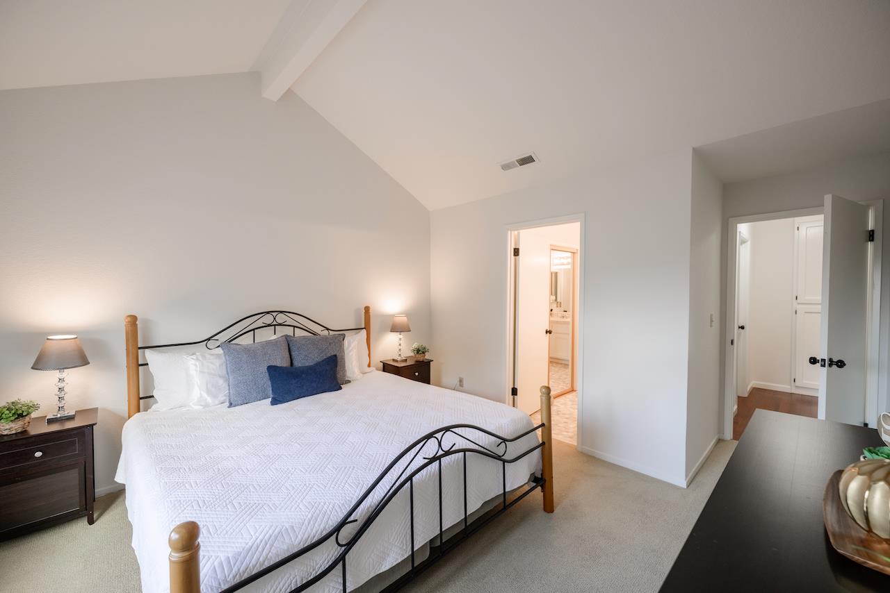 132 Arabian Way Scotts Valley, CA 95066 - Photo 40 of 82 a bedroom with a bed and wooden floor