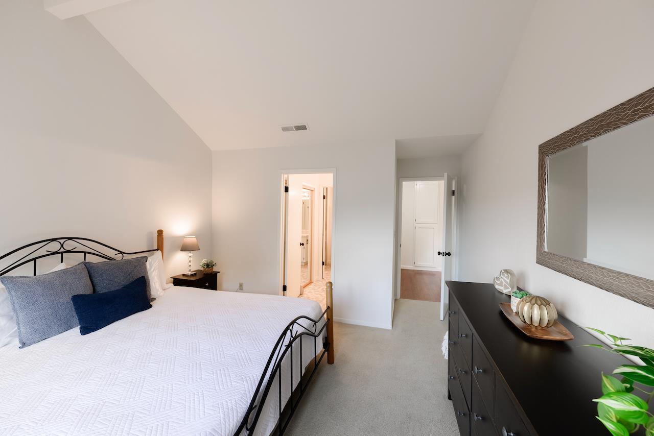 132 Arabian Way Scotts Valley, CA 95066 - Photo 41 of 82 a bedroom with a bed and a lamp