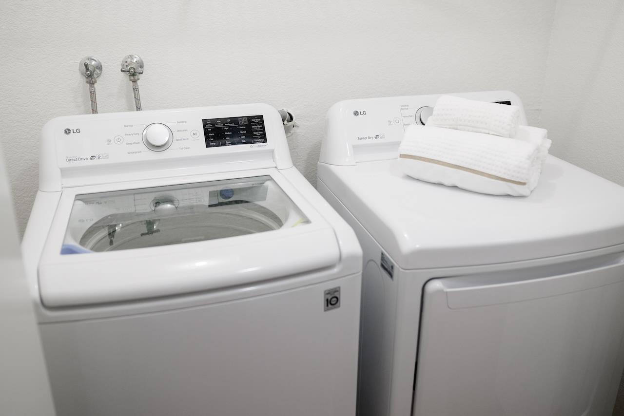 132 Arabian Way Scotts Valley, CA 95066 - Photo 48 of 82 a utility room with dryer and washer