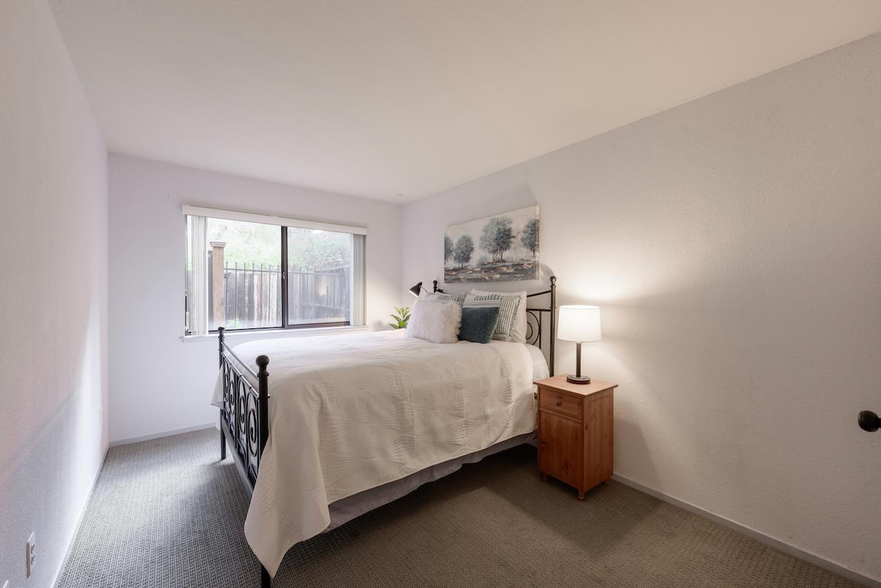 132 Arabian Way Scotts Valley, CA 95066 - Photo 50 of 82 a bed sitting in a bedroom next to a window