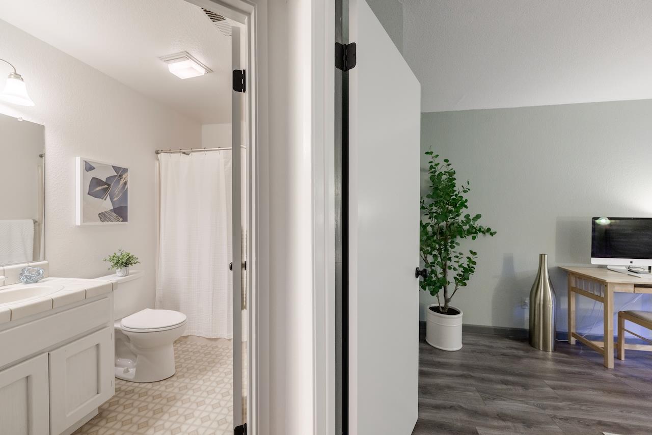 132 Arabian Way Scotts Valley, CA 95066 - Photo 54 of 82 a view of bathroom with a potted plant on the counter and toilet