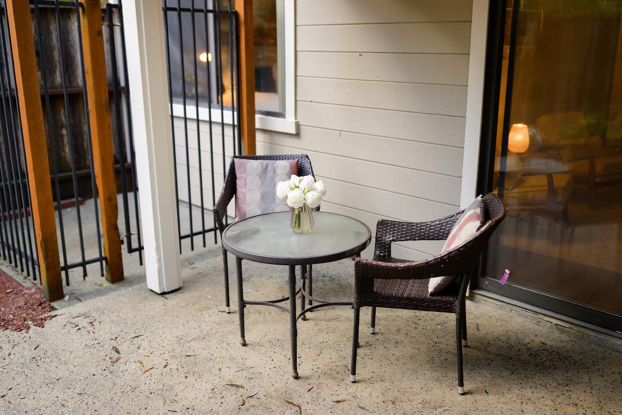 132 Arabian Way Scotts Valley, CA 95066 - Photo 61 of 82 a balcony with table and chairs