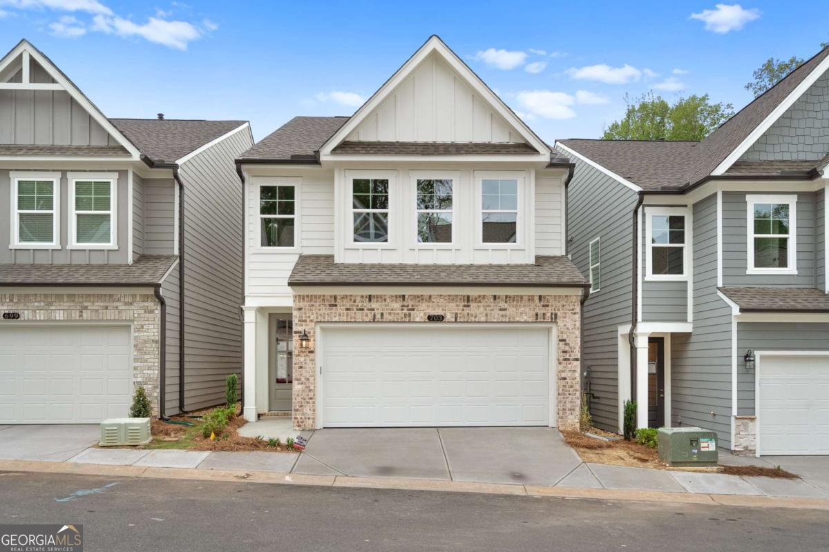 703 Smokey Quartz Way Kennesaw, GA 30144 - Photo 1 of 1 front view of a house with a street