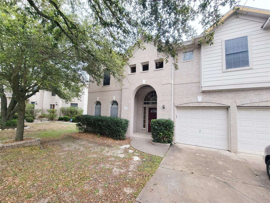 6708 Kilt Court Austin, TX 78754 - Photo 1 of 32 a view of a white house with a yard and large tree