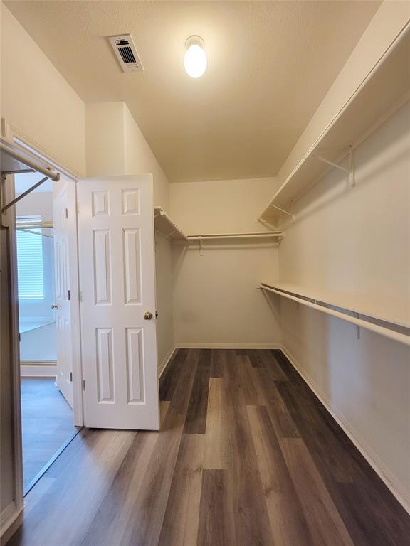 6708 Kilt Court Austin, TX 78754 - Photo 18 of 32 a view of a hallway with wooden floors