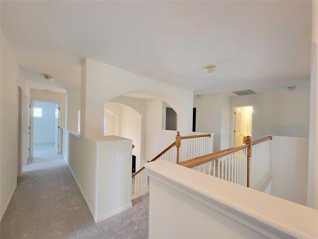 6708 Kilt Court Austin, TX 78754 - Photo 20 of 32 a view of a hallway with white walls
