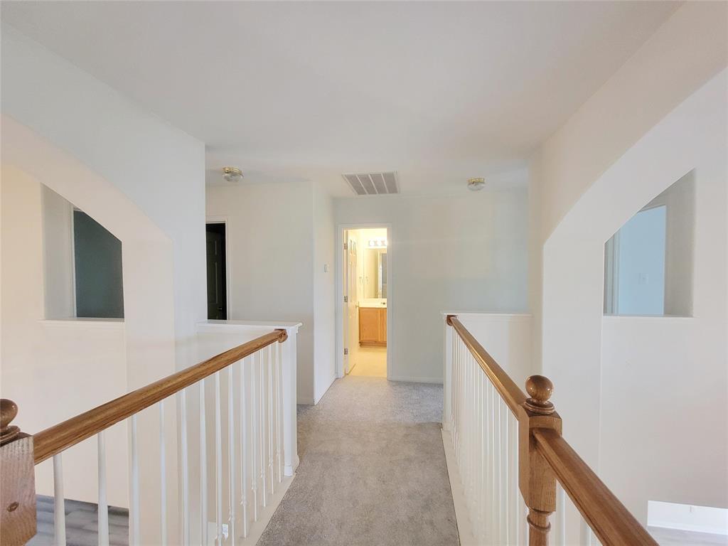 6708 Kilt Court Austin, TX 78754 - Photo 21 of 32 a view of hallway with stairs