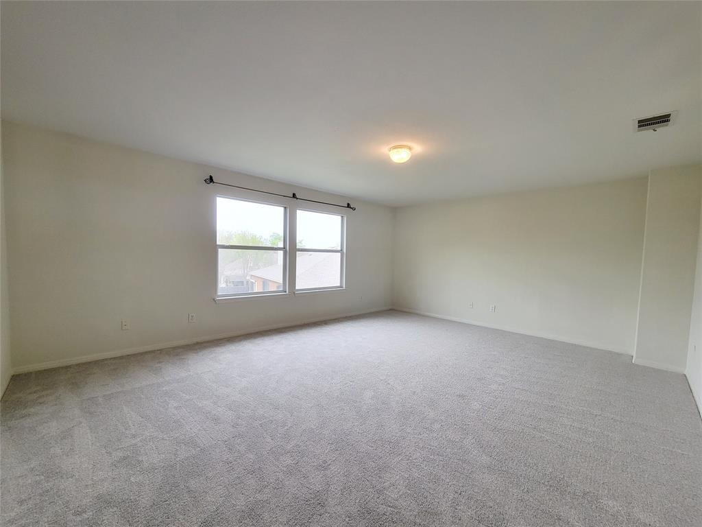 6708 Kilt Court Austin, TX 78754 - Photo 22 of 32 an empty room with windows