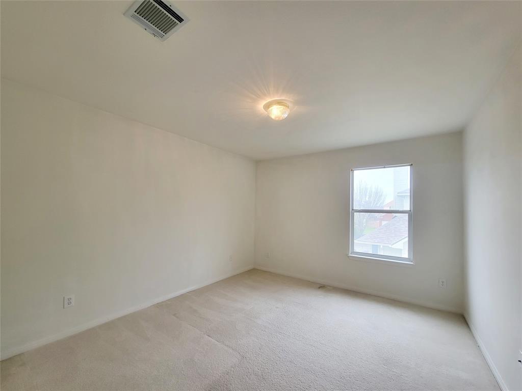 6708 Kilt Court Austin, TX 78754 - Photo 23 of 32 an empty room with a window