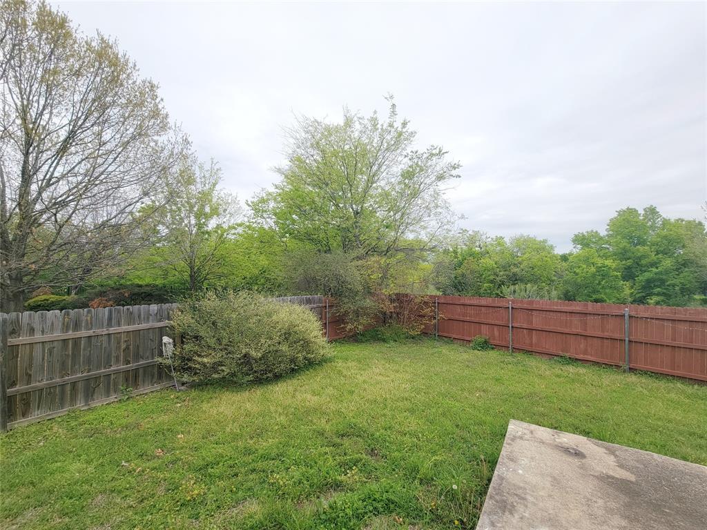 6708 Kilt Court Austin, TX 78754 - Photo 30 of 32 a view of a backyard with a garden