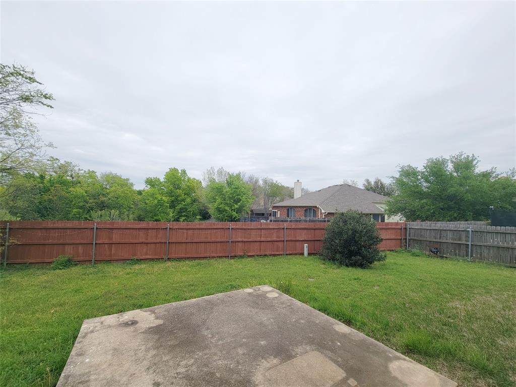 6708 Kilt Court Austin, TX 78754 - Photo 31 of 32 a view of outdoor space with yard and outdoor seating