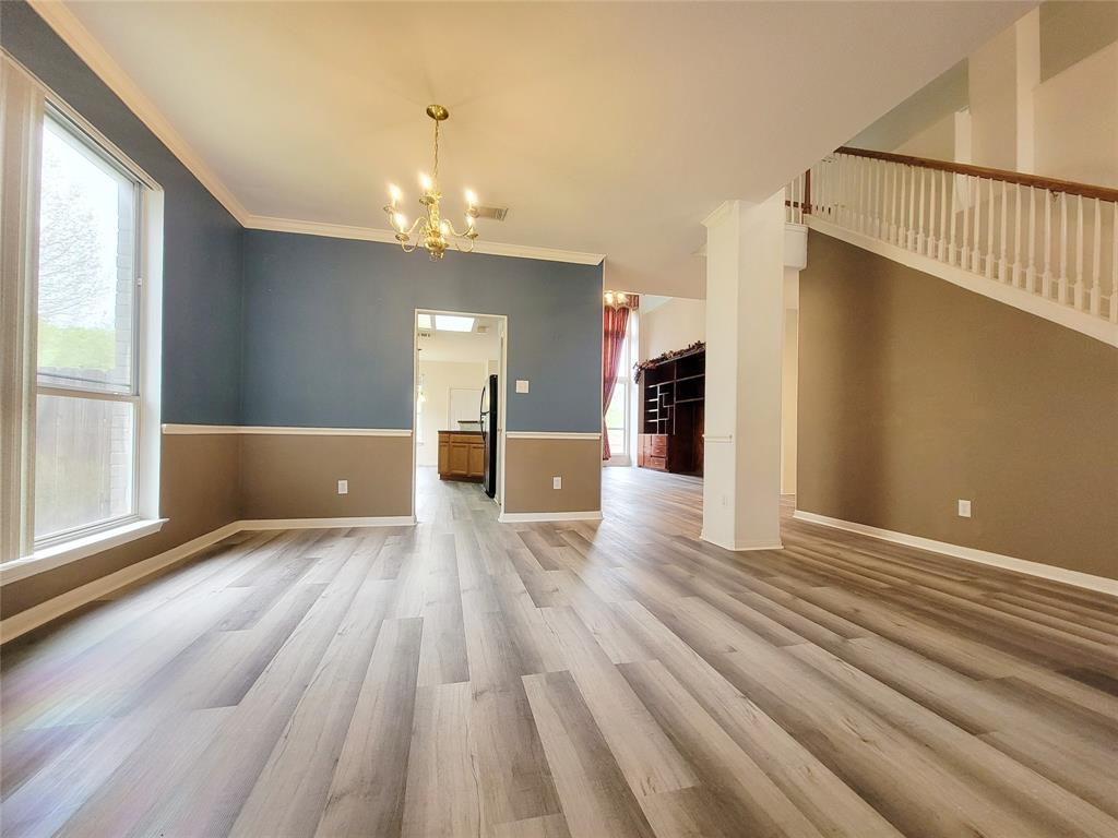 6708 Kilt Court Austin, TX 78754 - Photo 6 of 32 a view of a livingroom with wooden floor