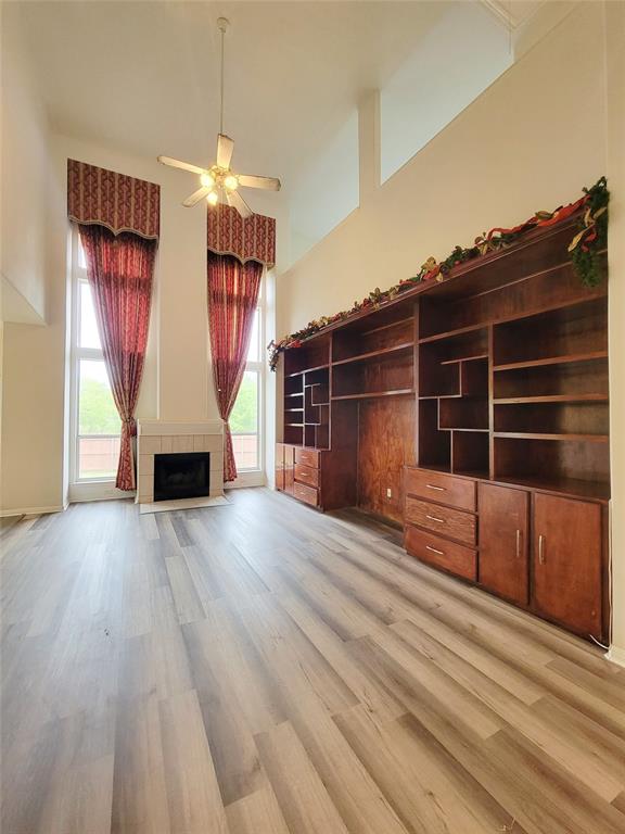 6708 Kilt Court Austin, TX 78754 - Photo 10 of 32 a view of wooden floor and windows in a room