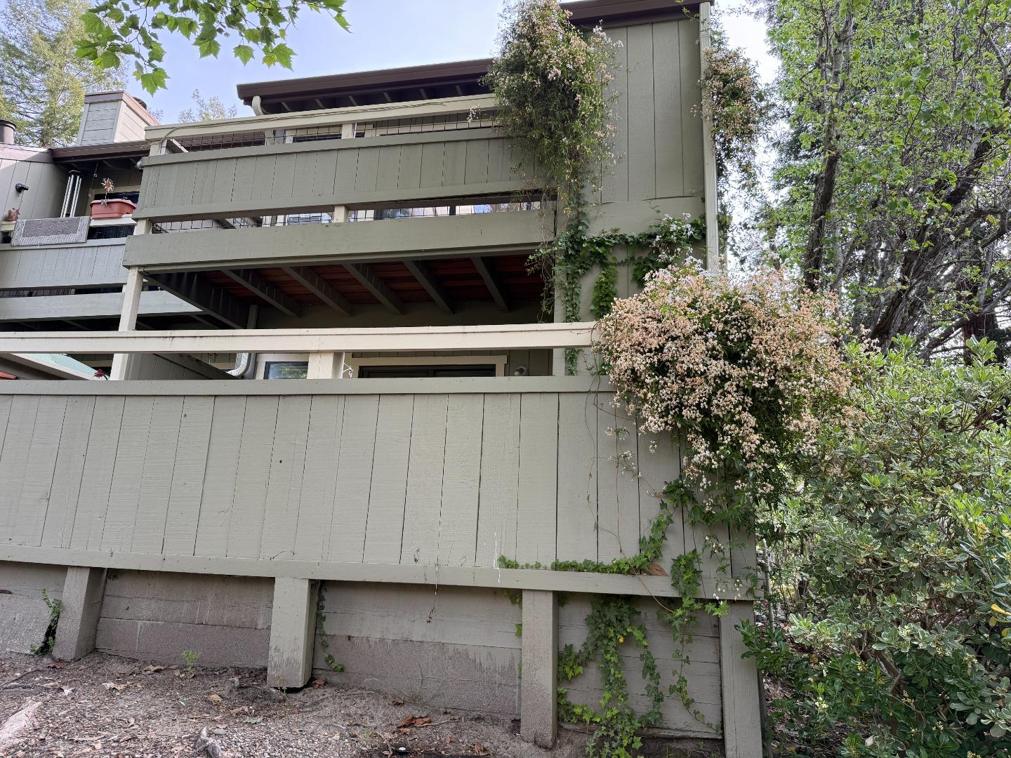 111 Bean Creek Road, Unit 146 Scotts Valley, CA 95066 - Photo 11 of 13 a view of a house with a garage