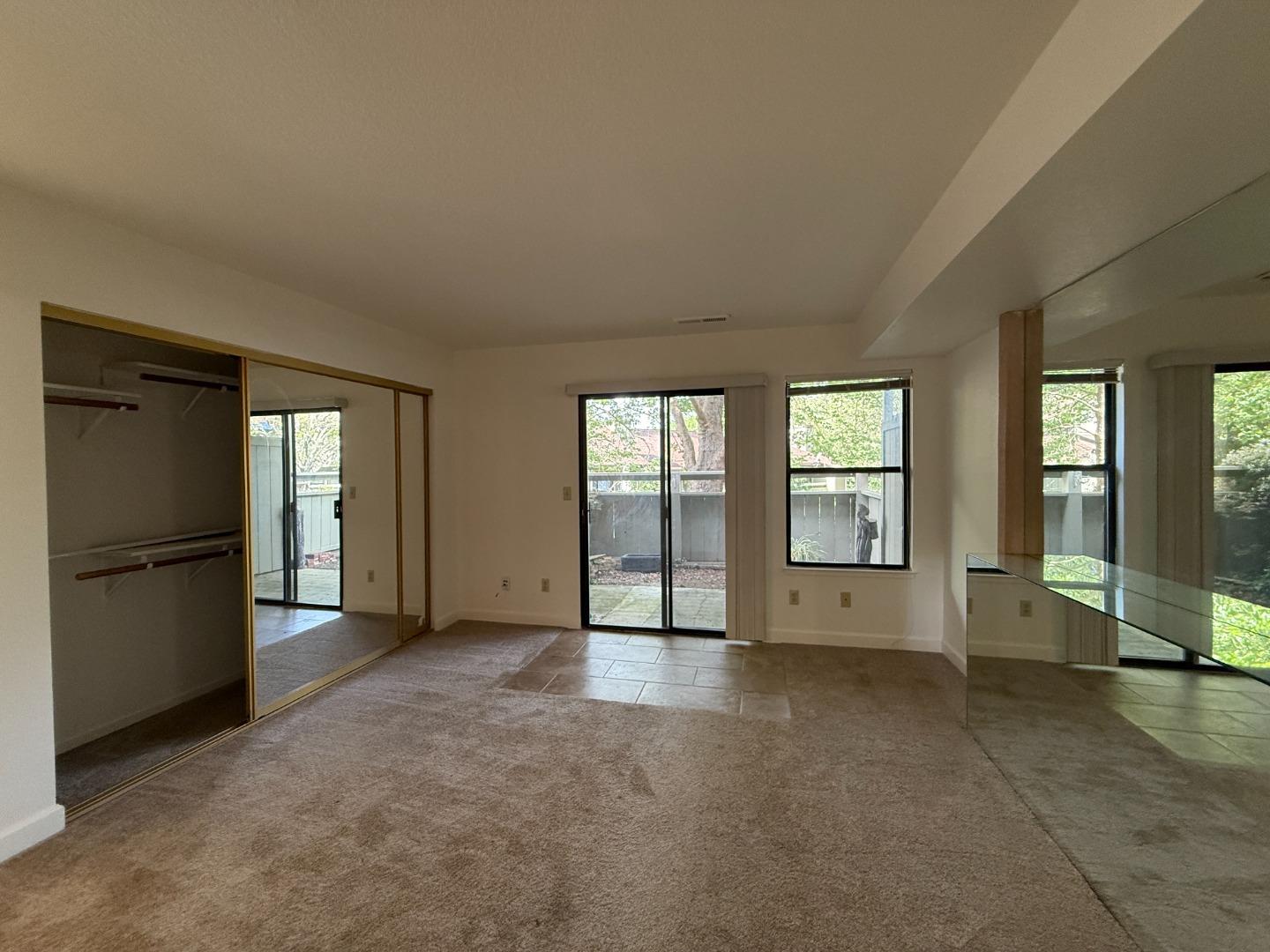 111 Bean Creek Road, Unit 146 Scotts Valley, CA 95066 - Photo 4 of 13 an empty room with windows
