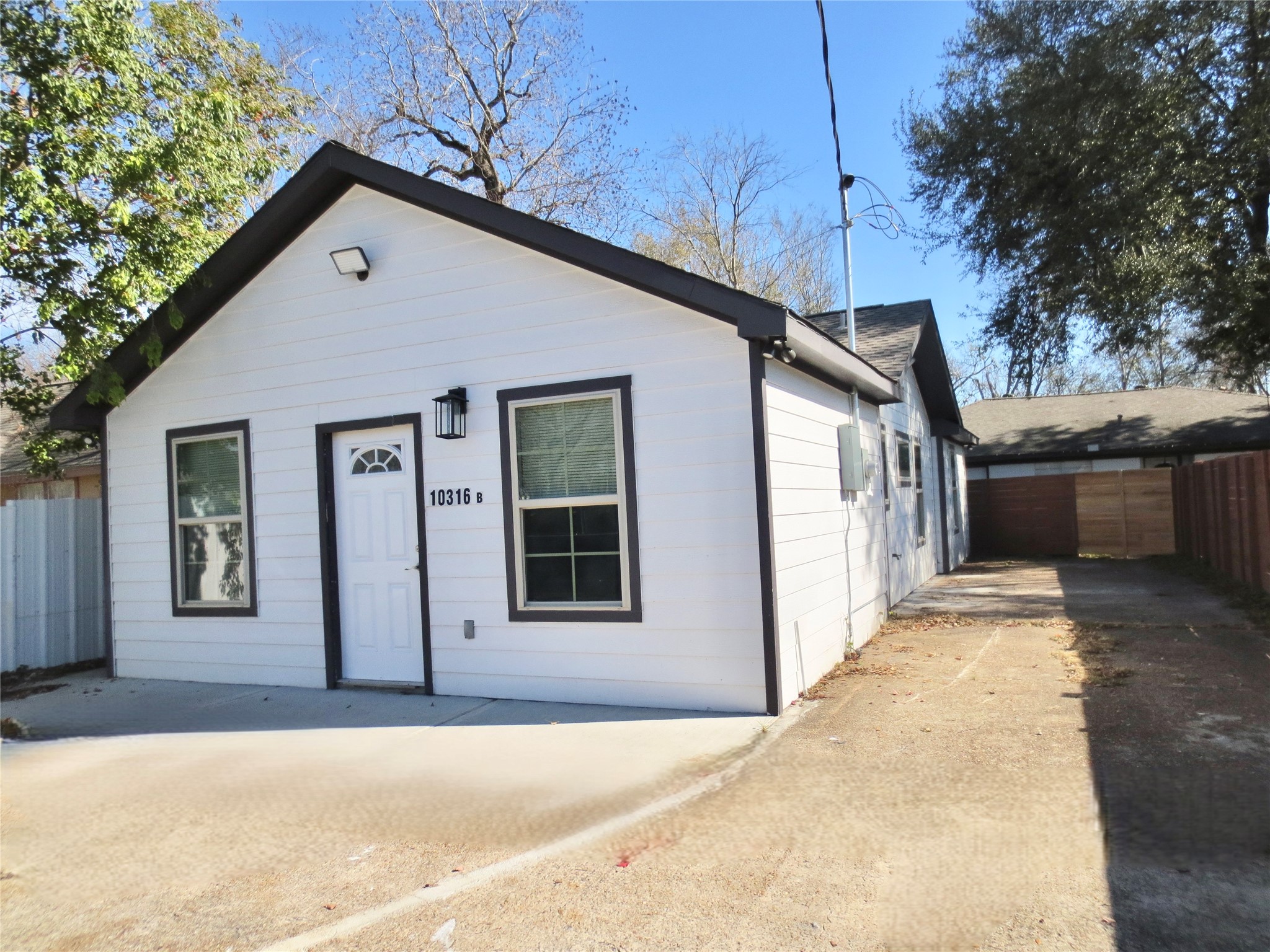 10316 Aldine Westfield Road Houston, TX 77093 - Photo 13 of 13 a view of a house with a yard