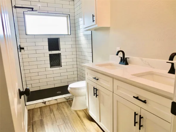 a bathroom with a sink and a toilet