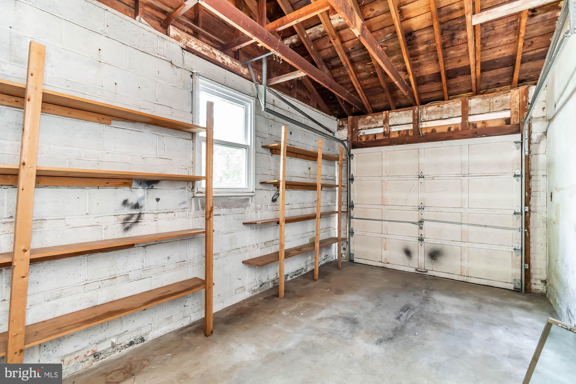 911 Weatherbee Road Baltimore, MD 21286 - Photo 32 of 34 Garage is plenty deep for mudroom area AND a car