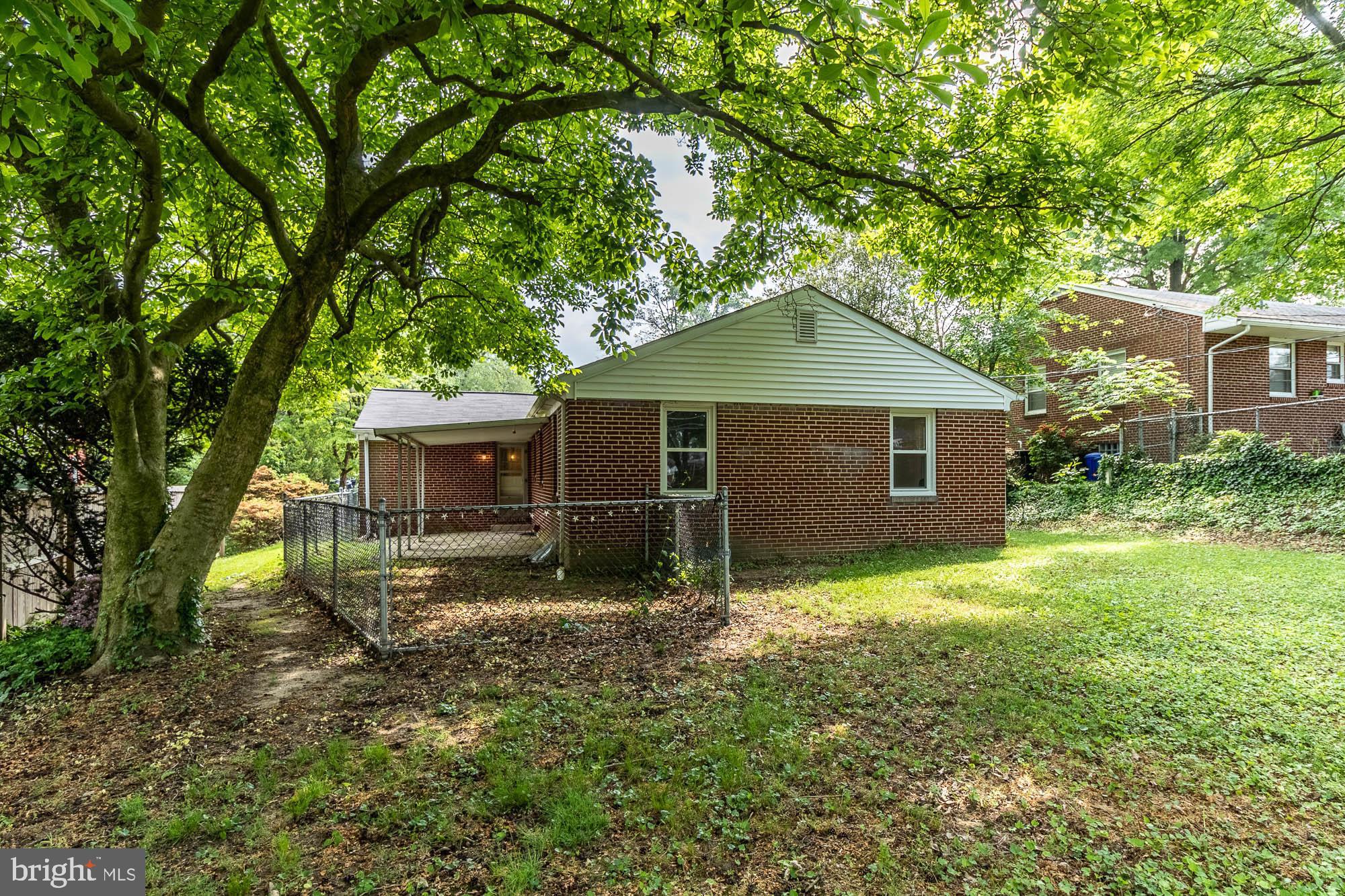 911 Weatherbee Road Baltimore, MD 21286 - Photo 34 of 34 Fenced and covered patio off kitchen - private