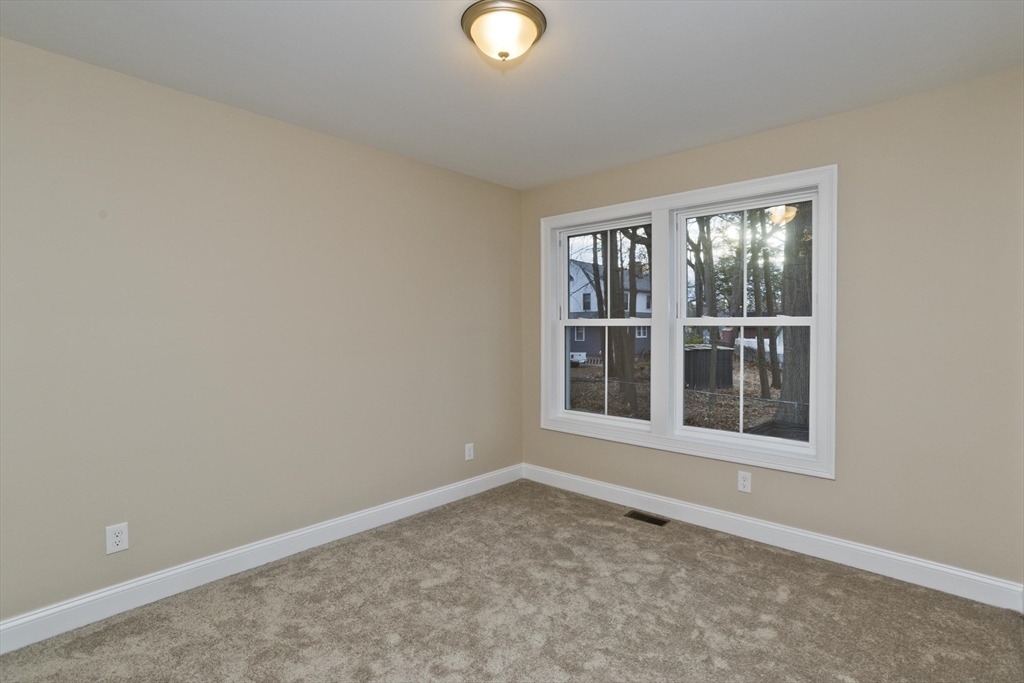 40 Preston Street Springfield, MA 01109 - Photo 23 of 32 an empty room with a window