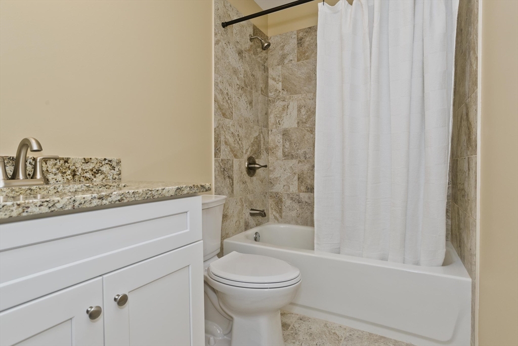 40 Preston Street Springfield, MA 01109 - Photo 24 of 32 a bathroom with a toilet a sink and a bathtub