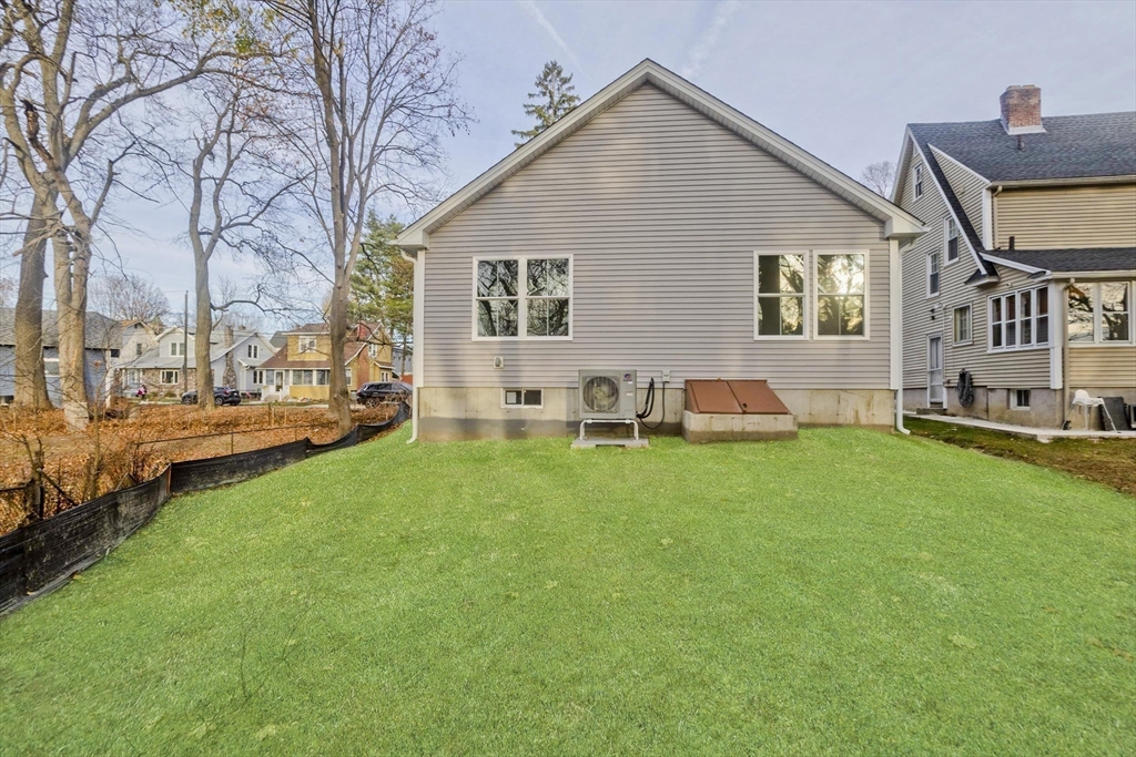 40 Preston Street Springfield, MA 01109 - Photo 30 of 32 a view of an house with backyard space and sitting area