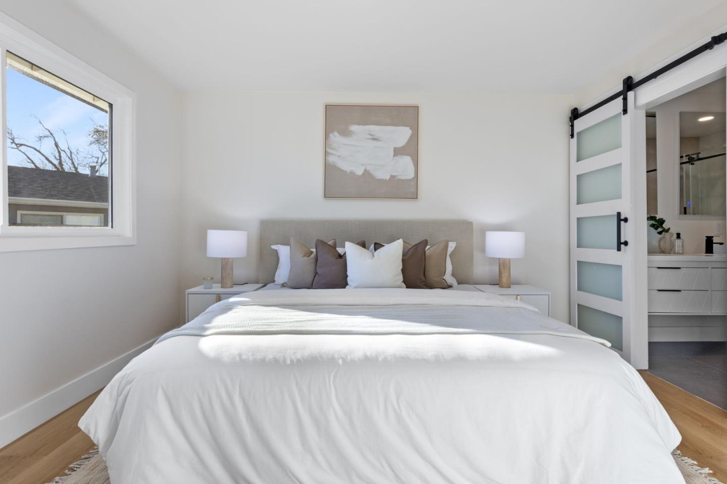 390 Valmy Street Milpitas, CA 95035 - Photo 19 of 37 a bedroom with a bed and a painting on the wall