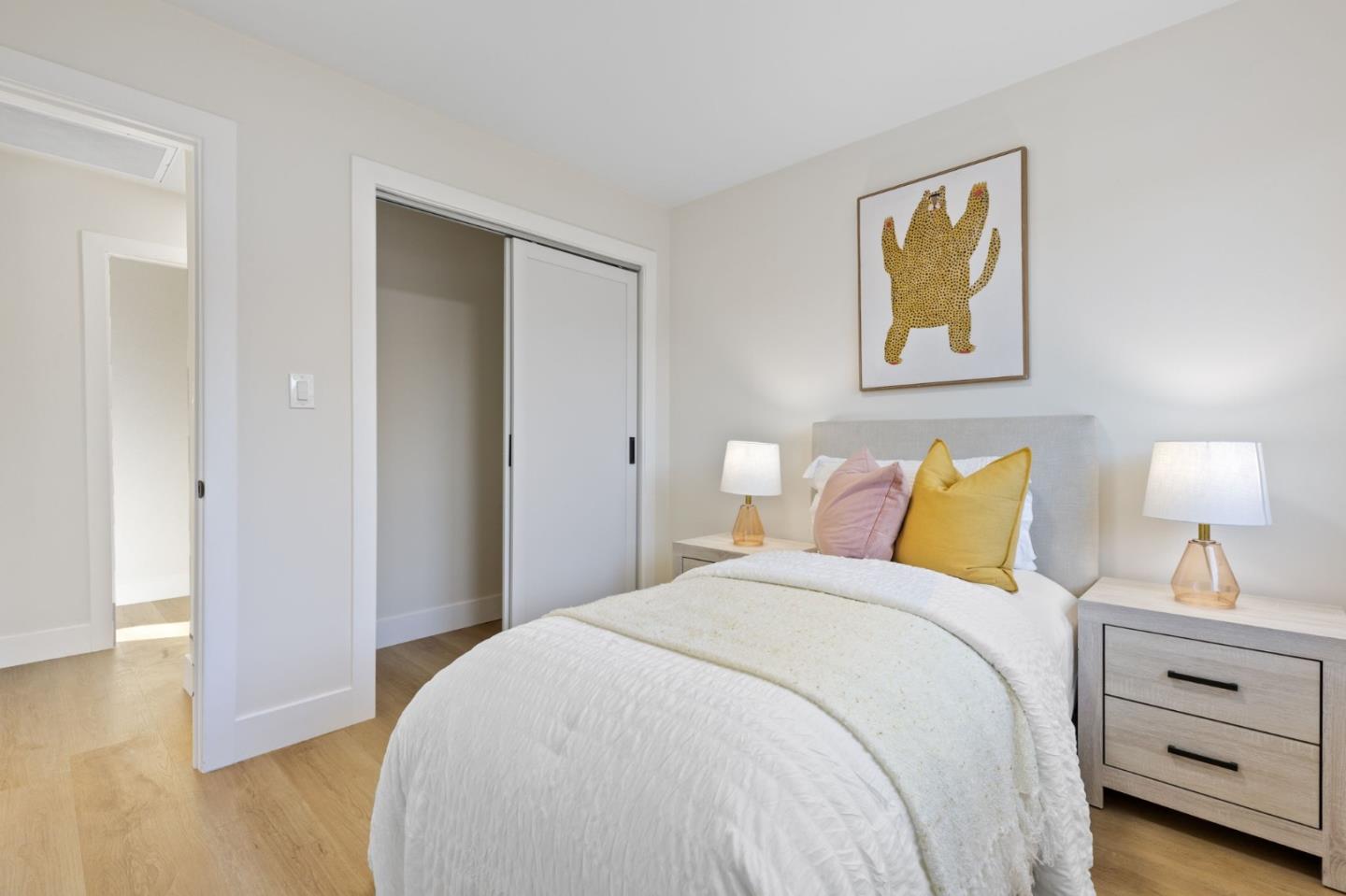 390 Valmy Street Milpitas, CA 95035 - Photo 23 of 37 a bedroom with a bed and wooden floor