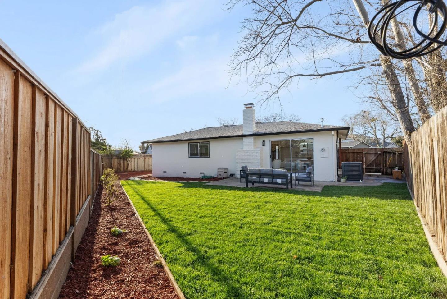 390 Valmy Street Milpitas, CA 95035 - Photo 25 of 37 a view of a house with backyard and sitting area