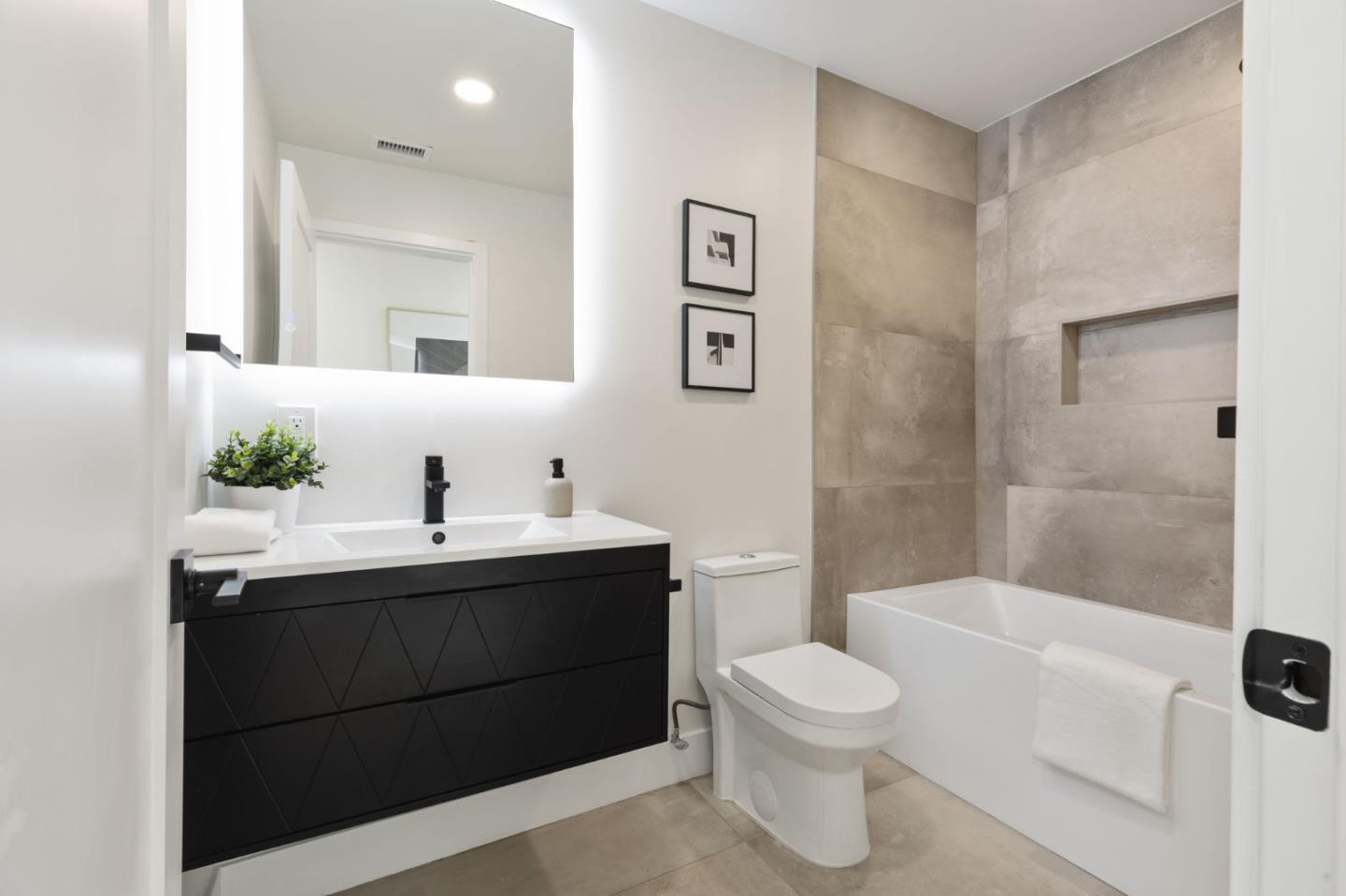 390 Valmy Street Milpitas, CA 95035 - Photo 30 of 37 a bathroom with a toilet a sink and bathtub