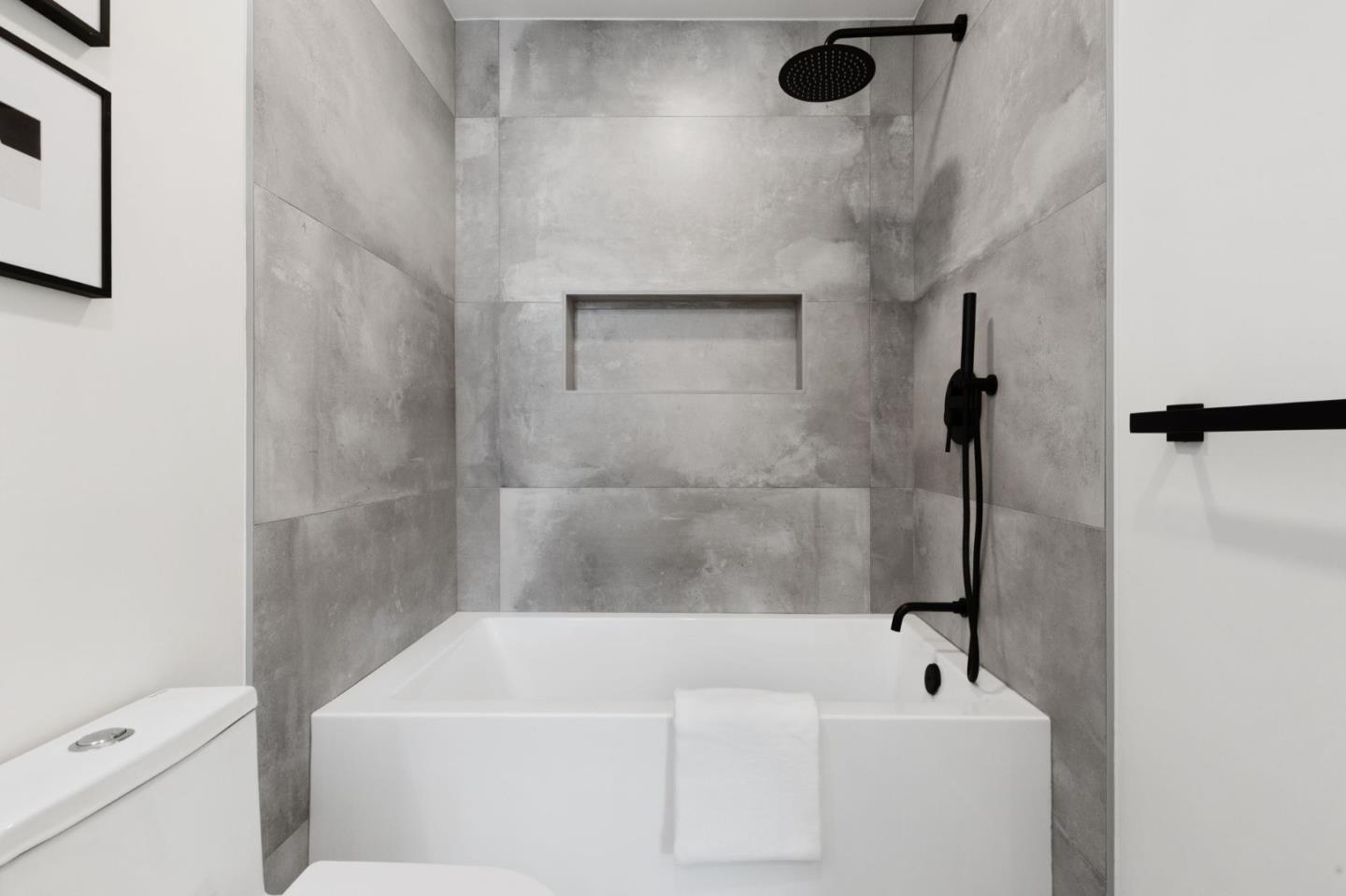 390 Valmy Street Milpitas, CA 95035 - Photo 31 of 37 a bathroom with a sink a window and a shower